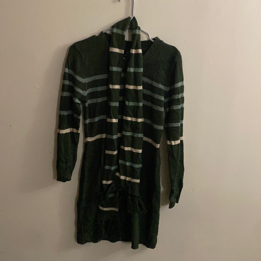Green knitted dress with light green and white stripes across middle & scarf